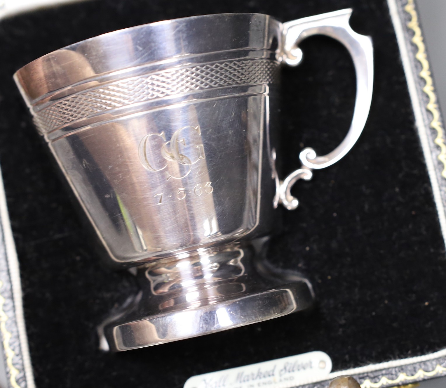 An Art Deco design silver christening can, Birmingham 1961, with fitted case, a toastrack and seven silver mounted items, 5 oz of weighable silver